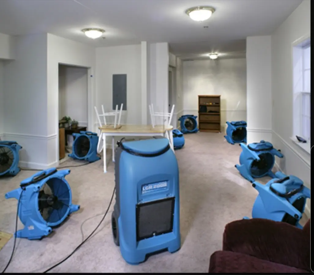 Air movers and dehumidifier setup for Water Damage Restoration in Wausau